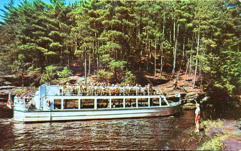 A tour boat enters Cold Water Canyon in the late 1940s.